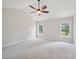 Spacious bedroom featuring vaulted ceiling, neutral walls, and large windows showcasing outdoor views at 3901 Yates Mill Trl, Raleigh, NC 27606