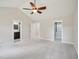 Bright bedroom with neutral walls, vaulted ceiling, with entrances to closet and bathroom at 3901 Yates Mill Trl, Raleigh, NC 27606
