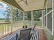 Relaxing screened porch with wood floors and views of the private backyard at 3901 Yates Mill Trl, Raleigh, NC 27606