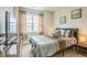 Well-lit bedroom with neutral tones, a large window, and comfortable furnishings at 40 Two Creeks Loop, Chapel Hill, NC 27517