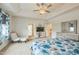 Spacious main bedroom with trey ceilings, ceiling fan and sitting area at 40 Two Creeks Loop, Chapel Hill, NC 27517
