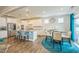 Open-concept kitchen with granite countertops, stainless steel appliances, and breakfast bar seating at 40 Two Creeks Loop, Chapel Hill, NC 27517