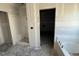 Unfinished bathroom with a bathtub, tiled shower, and open doorway at 4024 N Nc 581 Hwy, Kenly, NC 27542