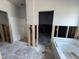 Bathroom under construction, with a new shower stall, bathtub, and exposed plumbing at 4024 N Nc 581 Hwy, Kenly, NC 27542