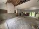 Spacious living room during construction, showcasing high ceilings, exposed framing, and natural light at 4024 N Nc 581 Hwy, Kenly, NC 27542