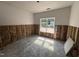 Bright room under construction with insulation, drywall work, and a large window at 4024 N Nc 581 Hwy, Kenly, NC 27542