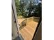 New home includes a wooden deck overlooking a tree filled yard at 4035 King Charles Rd, Durham, NC 27707