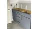 Bathroom features modern gray vanity with undermount sink at 4035 King Charles Rd, Durham, NC 27707