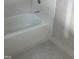 Clean bathtub with white subway tile is ready for relaxing baths at 4035 King Charles Rd, Durham, NC 27707