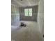 Bedroom showing a window that allows natural light to fill the room, highlighting a peaceful retreat at 4035 King Charles Rd, Durham, NC 27707