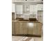 Spacious kitchen being built with custom island, white upper cabinets, and gray lower cabinets at 4035 King Charles Rd, Durham, NC 27707