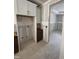 Close-up of kitchen cabinets being installed during home construction at 4035 King Charles Rd, Durham, NC 27707