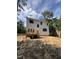 Modern two-story home has rear deck and contemporary windows at 4035 King Charles Rd, Durham, NC 27707