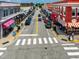 Charming downtown street with shops, restaurants, and lively atmosphere, ideal for residents and visitors at 405 Culvert St, Apex, NC 27502
