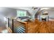 Comfortable living room with hardwood floors, sleeper sofa, and stylish table; filled with natural light at 405 Culvert St, Apex, NC 27502