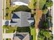 An aerial view of a house with a gray roof and well-maintained landscaping at 427 Cedar Pond Ct, Knightdale, NC 27545