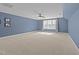 Expansive bedroom with ample natural light and neutral carpeting at 427 Cedar Pond Ct, Knightdale, NC 27545