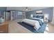 Beautiful primary bedroom features an ensuite bathroom and a walk-in closet at 427 Cedar Pond Ct, Knightdale, NC 27545
