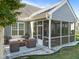Relax on this spacious outdoor patio with comfortable seating and a cozy fire pit at 427 Cedar Pond Ct, Knightdale, NC 27545