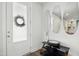 Bright foyer with modern mirrors and stylish entryway decor at 513 Basin Hill Dr, Wake Forest, NC 27587