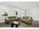 Spacious living area with modern decor, neutral colors, and bright, natural light at 513 Basin Hill Dr, Wake Forest, NC 27587