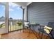 Cozy screened porch with outdoor furniture, perfect for relaxing and enjoying the weather at 513 Basin Hill Dr, Wake Forest, NC 27587