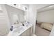 Elegant bathroom with double sink vanity, granite counters, and modern fixtures at 528 Folk Song Way, Wendell, NC 27591
