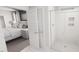 A bedroom attached to a bathroom includes a large bed and tiled shower at 528 Folk Song Way, Wendell, NC 27591