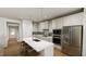 Spacious kitchen with stainless steel appliances, a large island, and open access to other living spaces at 528 Folk Song Way, Wendell, NC 27591