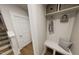 Functional mudroom with a built-in bench, storage cubbies, and convenient access to the staircase at 528 Folk Song Way, Wendell, NC 27591