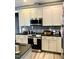 Modern kitchen features stainless steel appliances, granite countertops and ample storage at 55 Running Deer Path, Timberlake, NC 27583