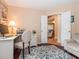 Bright office with white desk, dark wood floors, and a comfortable chair at 5536 Centipede Trl, Raleigh, NC 27610
