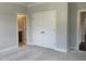 Bedroom featuring closet and door way leading to bathroom at 5649 Cayden Cove Dr, Wendell, NC 27591