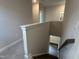 Staircase leading downstairs from second floor at 5649 Cayden Cove Dr, Wendell, NC 27591