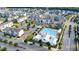 Aerial view showcasing community amenities, including a pool, clubhouse, and playground at 6107 Kayton St, Raleigh, NC 27616