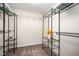 Walk-in closet with metal shelving and storage, offering plenty of space for organizing clothes and accessories at 6107 Kayton St, Raleigh, NC 27616