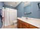 Cozy bathroom with a tub and shower combination and a single sink vanity offering storage space at 642 Pinevalley Ln, Sanford, NC 27332