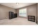Empty bedroom with neutral walls, carpet and minimal furnishings at 642 Pinevalley Ln, Sanford, NC 27332