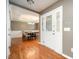 View of the entryway leading to a dining room with a chandelier and seating for six at 642 Pinevalley Ln, Sanford, NC 27332