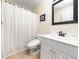 Cozy half bath with updated fixtures and natural lighting at 65 Shorrey Pl, Youngsville, NC 27596