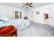 Light-filled bedroom with plush carpet, walk-in closet and en suite bath access at 65 Shorrey Pl, Youngsville, NC 27596