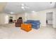 Spacious bonus room featuring plush seating, a classic wooden chest, and access to multiple rooms at 65 Shorrey Pl, Youngsville, NC 27596