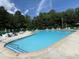 Enjoy a refreshing dip in the community pool surrounded by plenty of seating at 65 Shorrey Pl, Youngsville, NC 27596