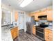 Updated kitchen with stainless steel appliances, granite countertops, and ample cabinetry at 65 Shorrey Pl, Youngsville, NC 27596