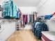Spacious walk-in closet with ample shelving and hanging storage at 65 Shorrey Pl, Youngsville, NC 27596