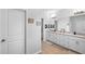 Elegant bathroom with double vanity, sleek countertop, and modern fixtures at 7117 Crested Iris Pl, Durham, NC 27703