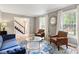 Bright living room with hardwood floors, comfortable seating, and lots of natural light at 7209 St Ledger Dr, Raleigh, NC 27613