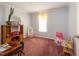 Bedroom or flex room with toys and light gray walls at 764 Olivers Grove Rd, Four Oaks, NC 27524