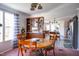 Bright dining room with a chandelier and an adjoining view into the kitchen at 764 Olivers Grove Rd, Four Oaks, NC 27524