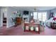 Cozy living room with grey walls, fireplace and sliding doors to a patio or deck at 764 Olivers Grove Rd, Four Oaks, NC 27524